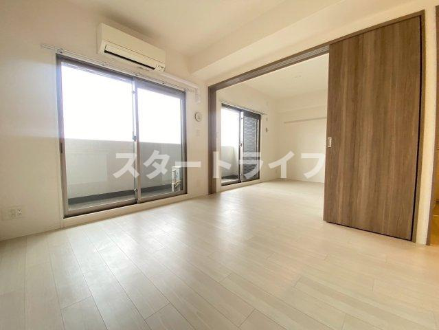 大阪市淀川区木川西２丁目の賃貸マンションの居間・リビング