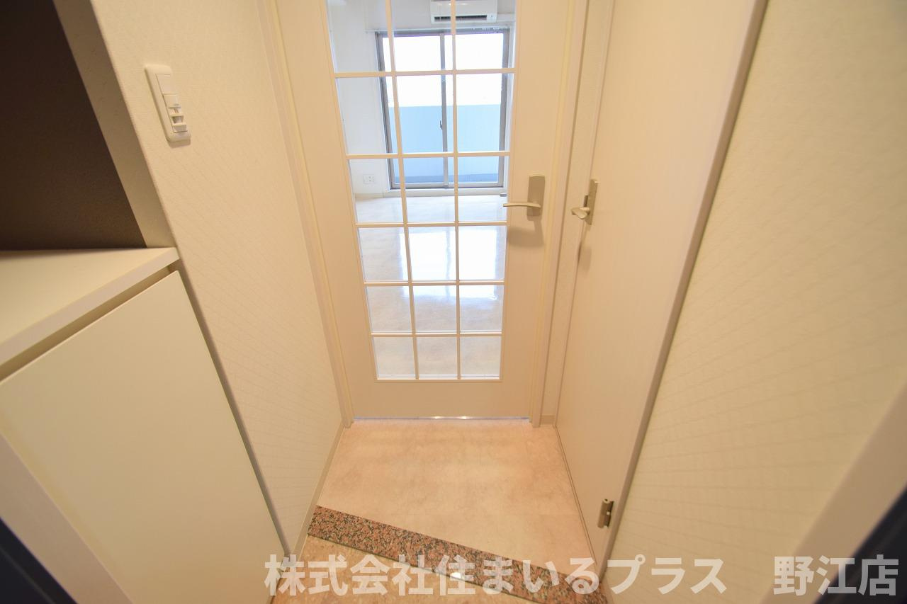 アクティコートクリスタル京橋の玄関