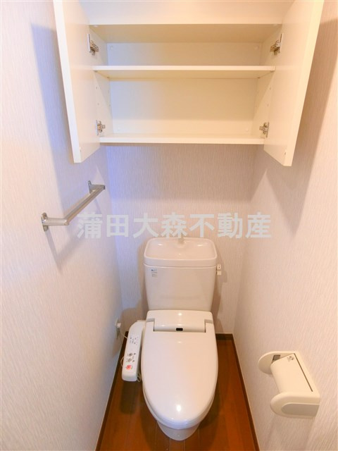 ヴェルステージ大森町駅前のトイレ|棚収納付きのトイレ