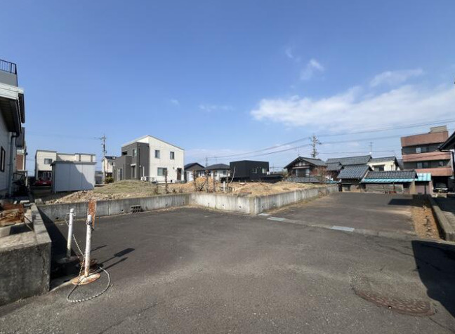 鯖江市三六町2丁目　マンション用地の前面道路含む現地写真