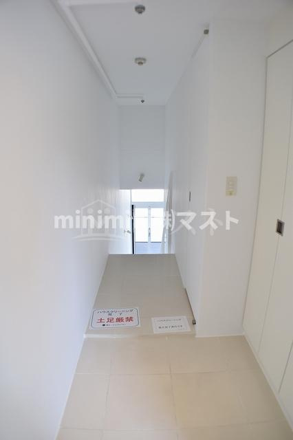 大阪市西区本田１丁目の賃貸マンションの玄関