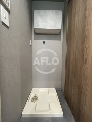 フロンティアテラス江坂(旧サムティ江坂JuReve)の独立洗面台|洗濯パン
