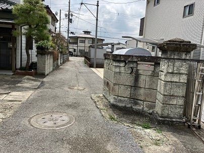 峰2丁目土地の前面道路含む現地写真