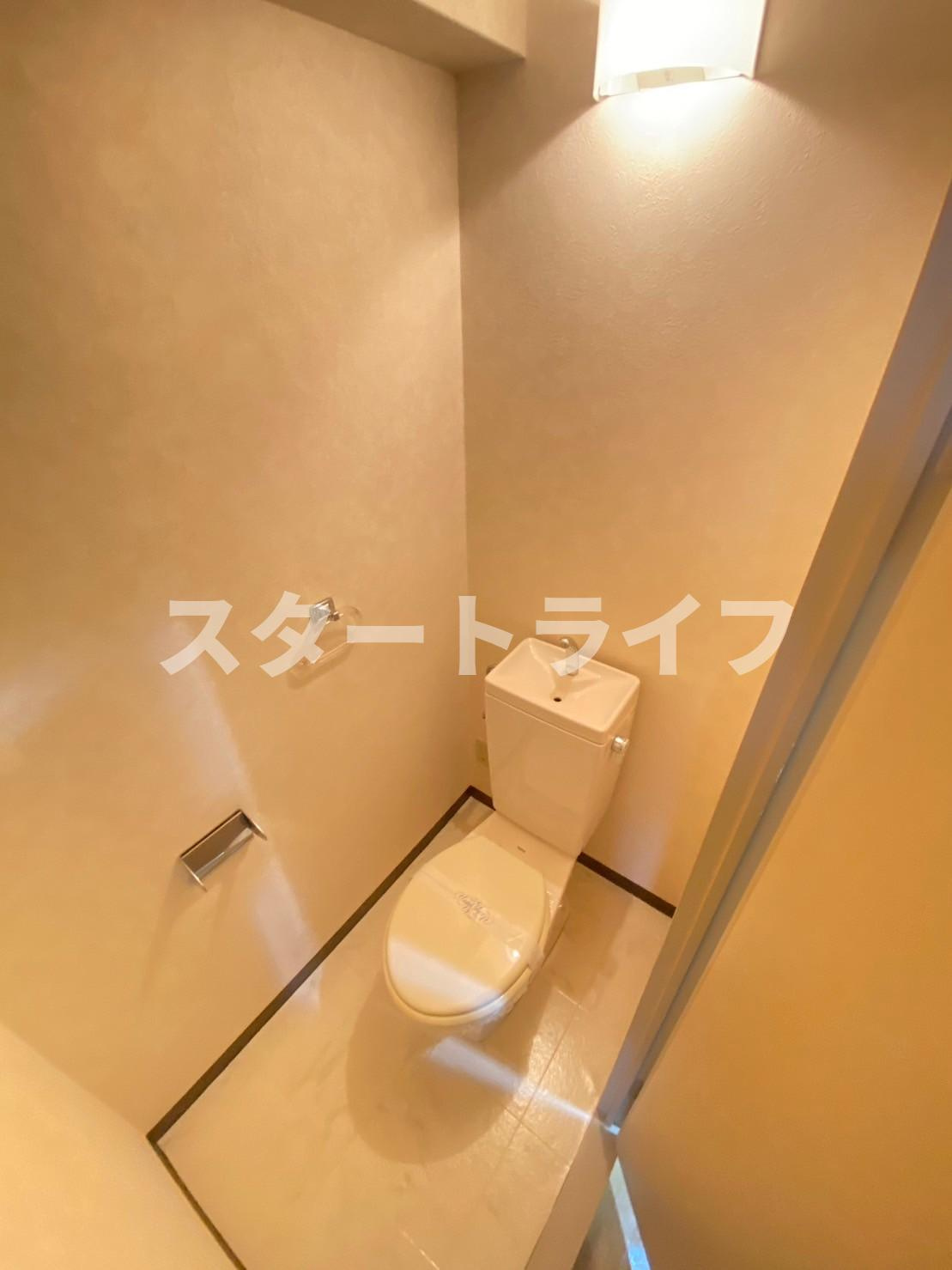 大阪市東淀川区東中島２丁目の賃貸マンションのトイレ