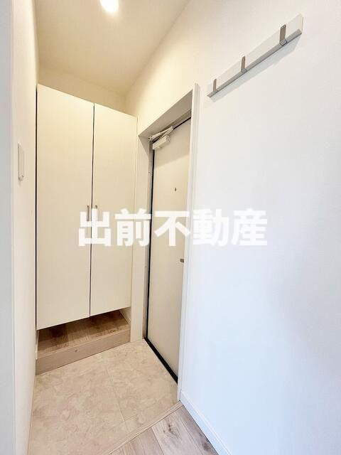 クリスタルコート中野南台の玄関