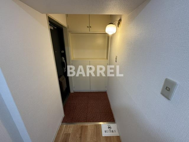 コープ野村江坂台の玄関