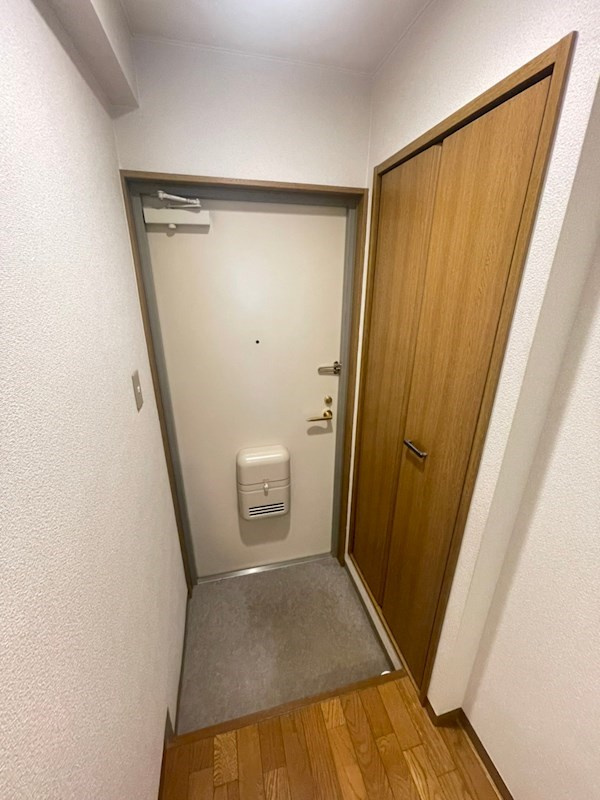TATディナスティ西本町の玄関