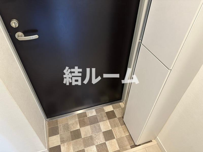 北区王子１丁目の賃貸マンションの玄関