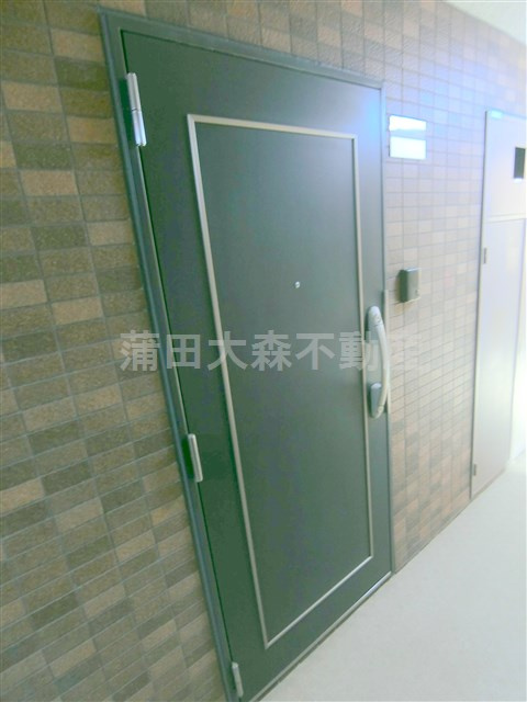 レジオス池上の玄関
