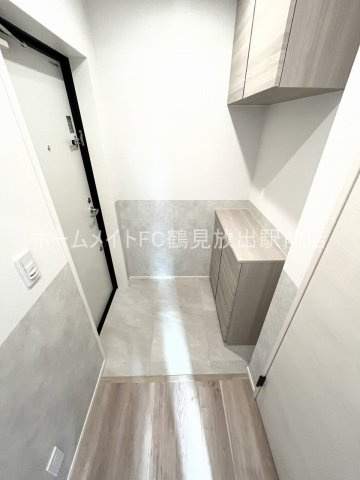 大阪市城東区諏訪２丁目のハイツの玄関