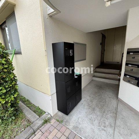 東香里野村マンション　庭付ペット可のエントランス