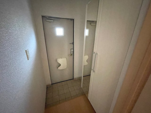 ヴィラ　カメリアーテの玄関