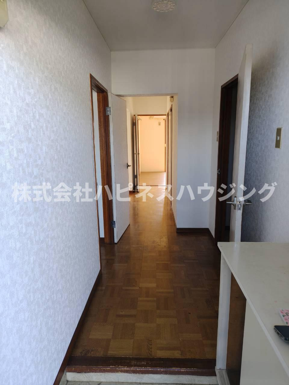 コーポ飯田第二マンションの玄関