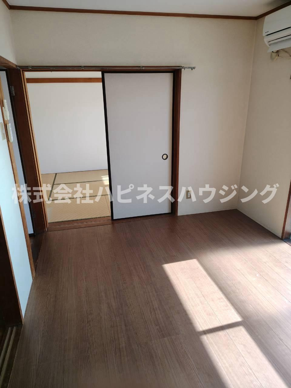 コーポ飯田第二マンションの洋室