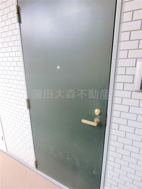 グローリア初穂東糀谷の玄関