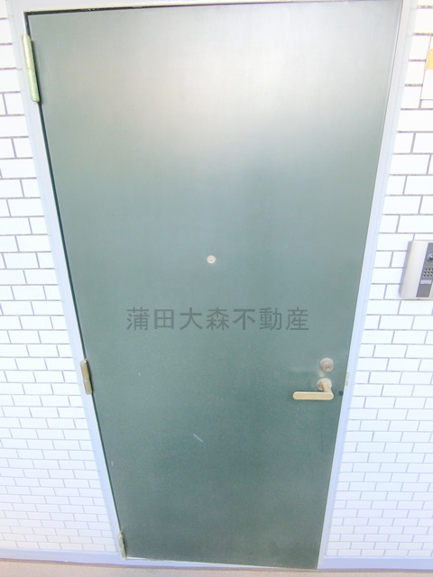 グローリア初穂東糀谷の玄関