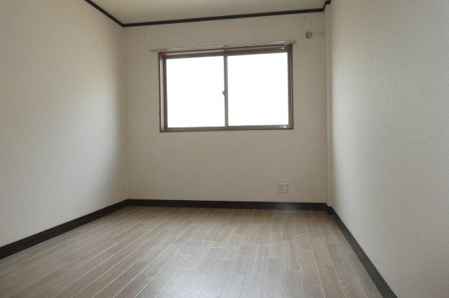 サンパレスフジタの寝室|洋室