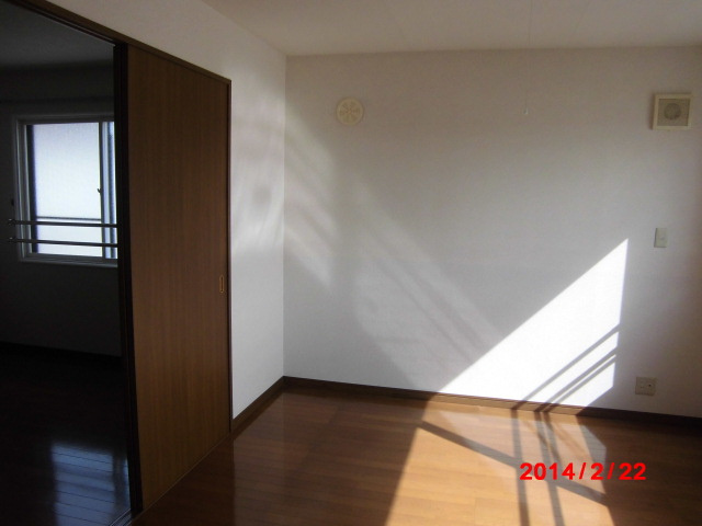 サンライズ住吉の洋室