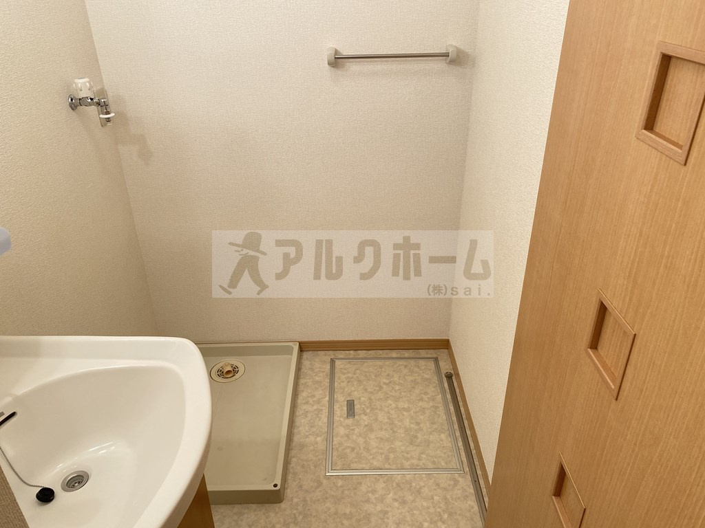 メゾンカムスの洗面所