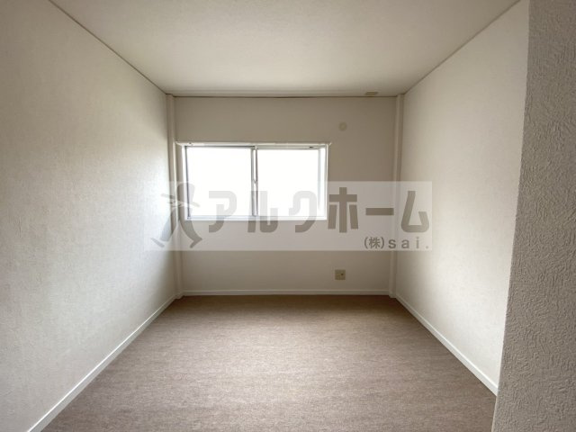 ウフルクア刑部3丁目の洋室