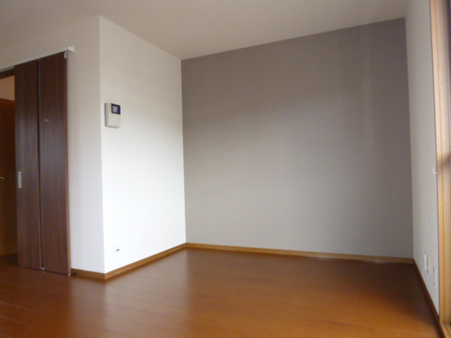 ぷらむハイツＡの居間・リビング