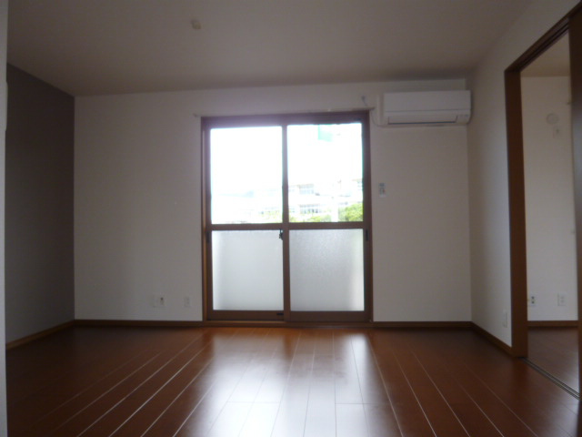 ぷらむハイツＡの居間・リビング