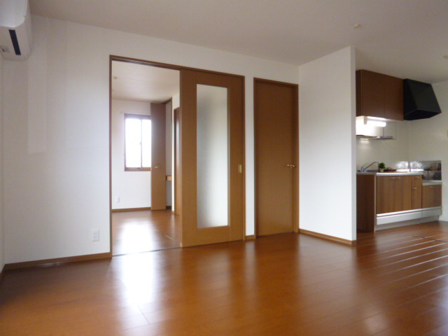 ぷらむハイツＡの居間・リビング