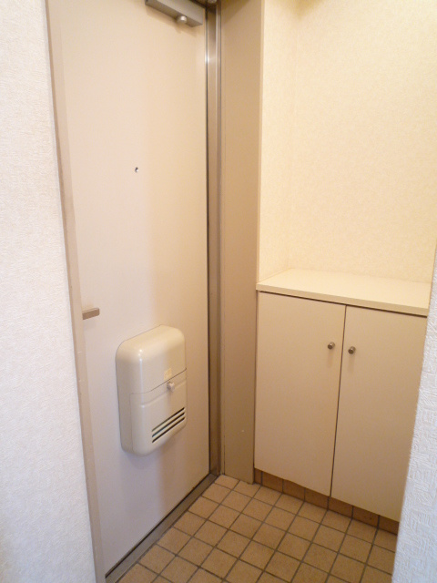 レヂオンス久米川パートⅤの玄関