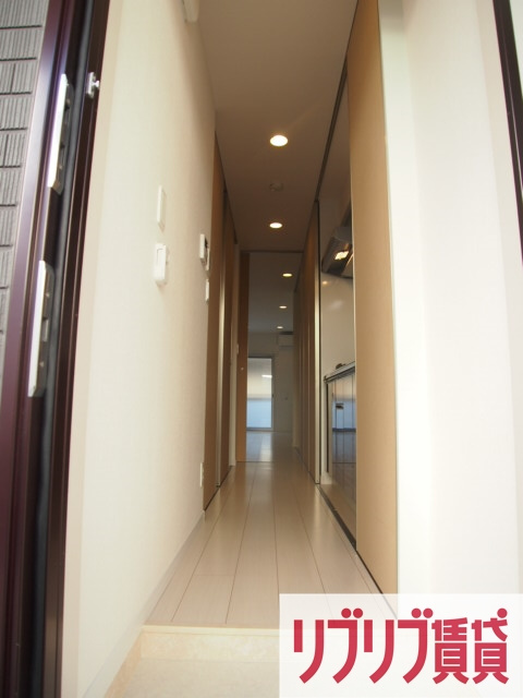 リブリ・CASA TRESの玄関
