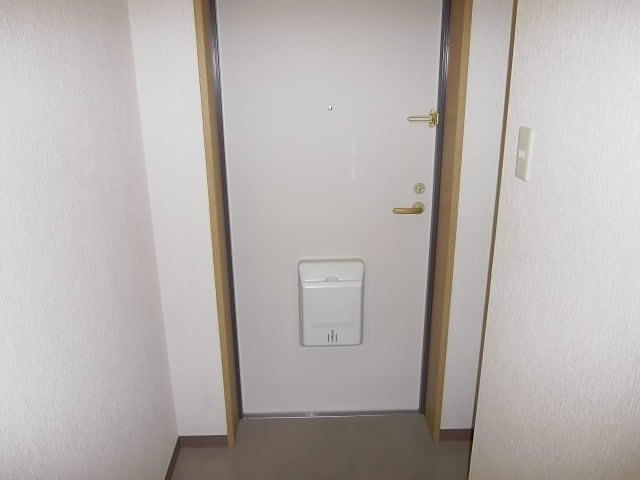 メゾンドールKの玄関