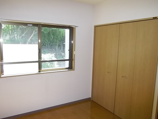 メゾンドールKの寝室