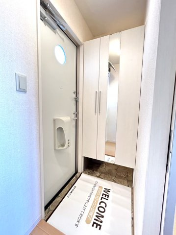 ピソ レセンテの玄関