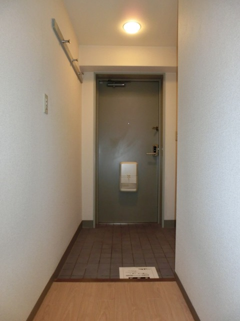 大阪市淀川区三国本町３丁目の賃貸マンションの玄関