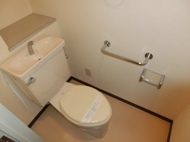 大阪市淀川区三国本町３丁目の賃貸マンションのトイレ