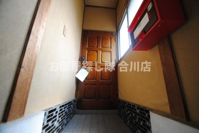 久留米市野中町の一戸建ての玄関