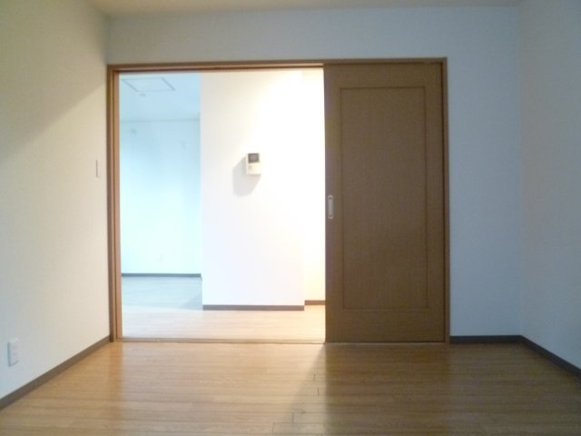 グランソシエ南堀江の洋室
