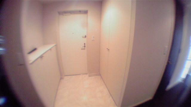 港区三田２丁目の賃貸マンションの玄関