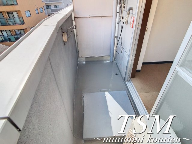 コーポ正宝　香里園のバルコニー|洗濯機置場