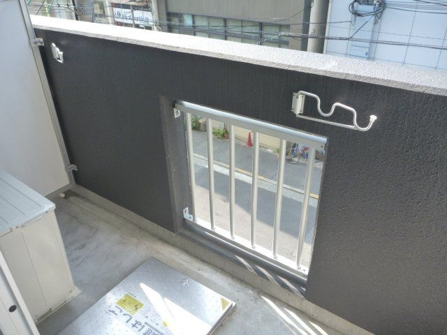 ブリリアントコート農人橋　BRAVI不動産のバルコニー