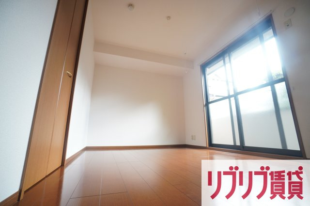 ロイヤルクレッセント西登戸の寝室