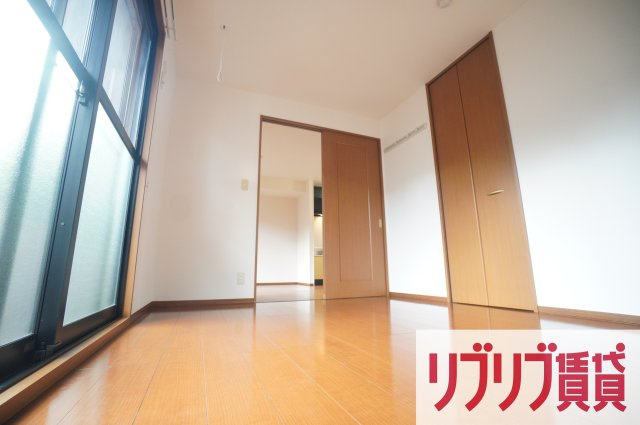 ロイヤルクレッセント西登戸の寝室