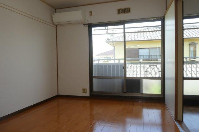 コーポサンライトⅡの居間・リビング|洋室