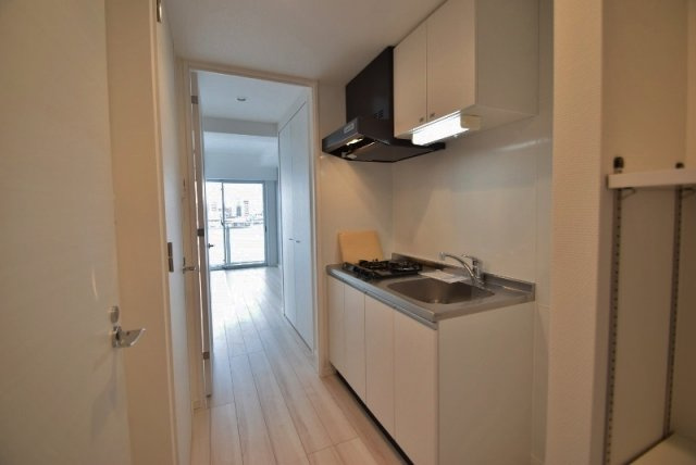 オーキッドレジデンス船橋本町の居間・リビング|キッチン周り