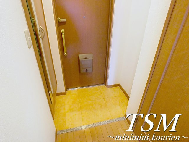 ロータリーマンション香里西之町の玄関