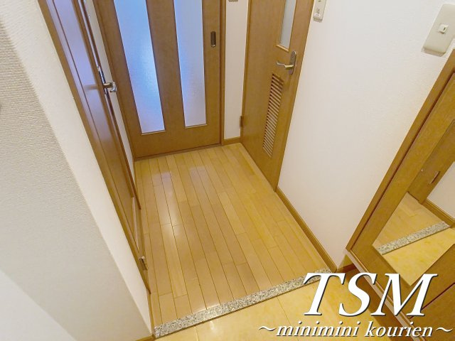 ロータリーマンション香里西之町の玄関