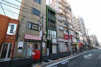 【外観】 | ミモザビル | ミモザビル　鶯谷駅から徒歩2分・入谷駅から徒歩8分の好立地。コンビニなど近くで買い物便利。言問通り沿いの物件です。鉄骨造4階建ての緑色のマンションです。