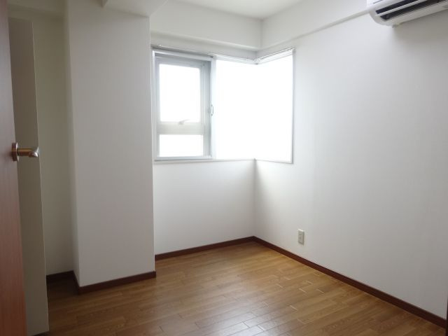 コンフィメゾン中山寺の寝室