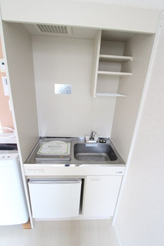 小倉クーベルタンの杜のキッチン|同物件の参考写真です。