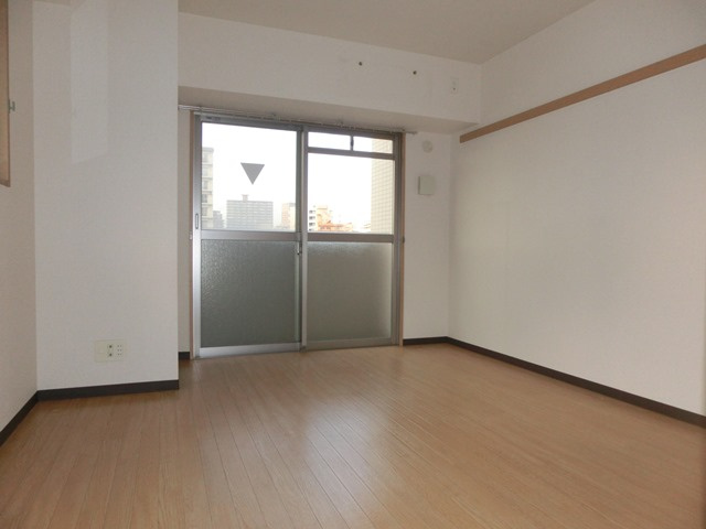 大阪市淀川区新高１丁目の賃貸マンションの洋室