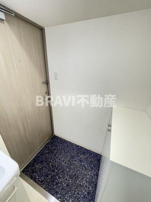 ブリリアントコート農人橋　BRAVI不動産の玄関